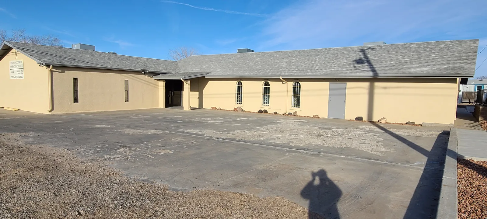 Seamless aluminum gutters and downspouts on the Kingman Centro de Adoracion Cristiana church building in Kingman, AZ