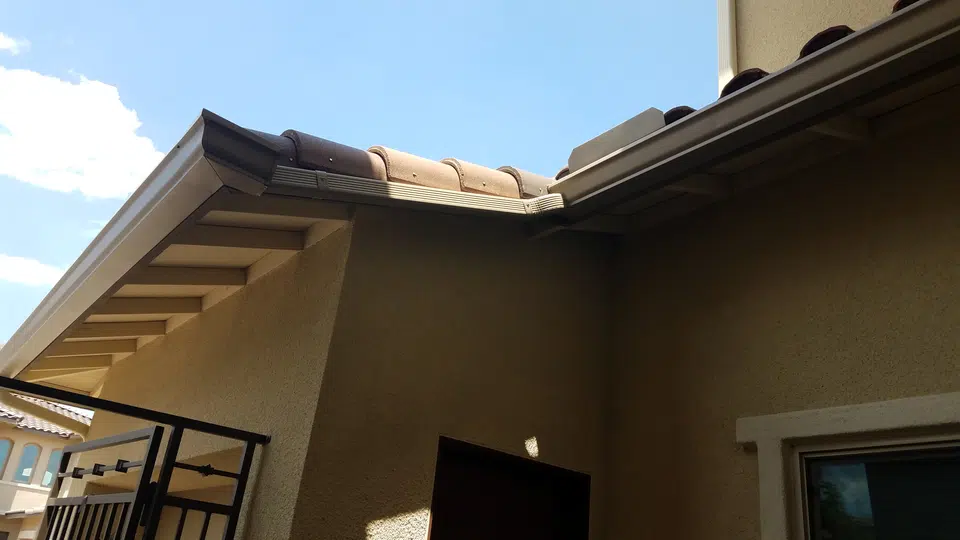 Completed gutter system with downspout routing