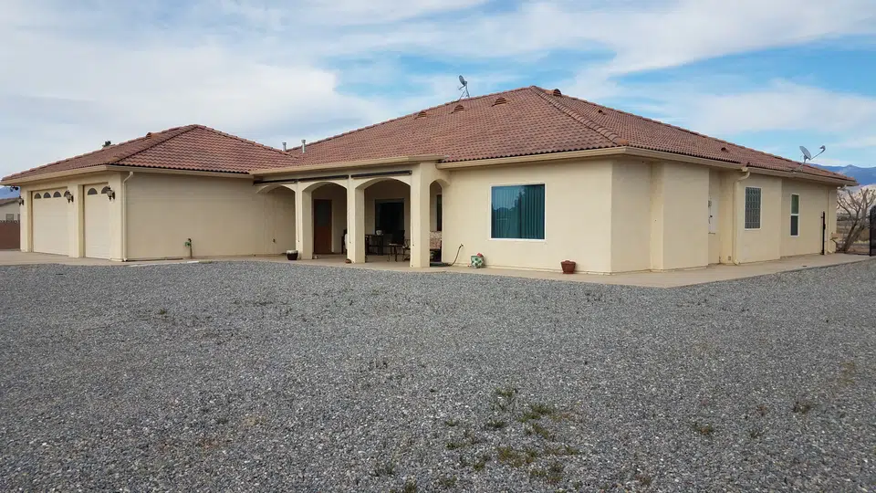 Finished roofline gutter installation on a Southwest home