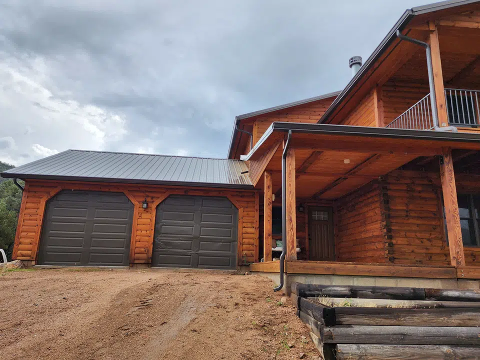 New gutters and downspout on a completed project