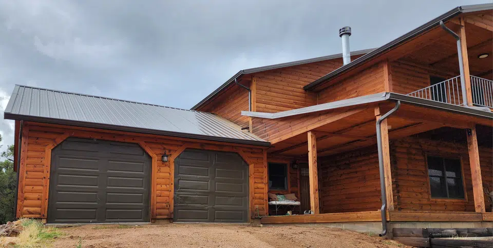 Completed gutter system with downspout routing