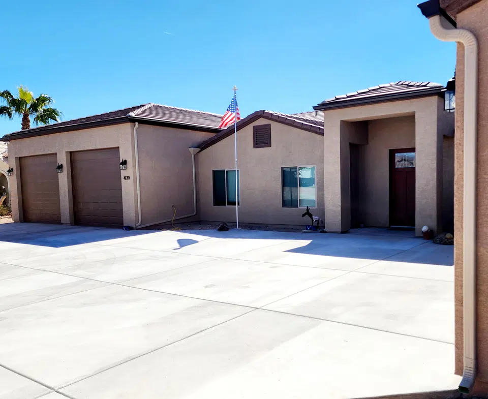 Finished roofline gutter installation on a Southwest home