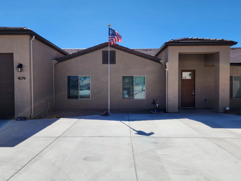 Rain gutter and downspout installation, completed work