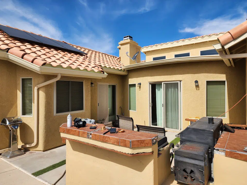 Rain gutter and downspout installation, completed work