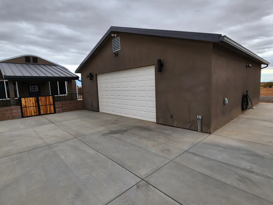 Eave line after seamless gutter installation