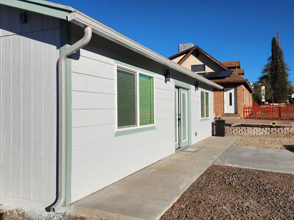 Roofline with newly installed seamless gutters