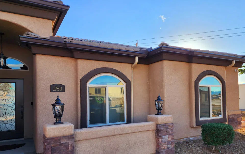 Roofline with newly installed seamless gutters