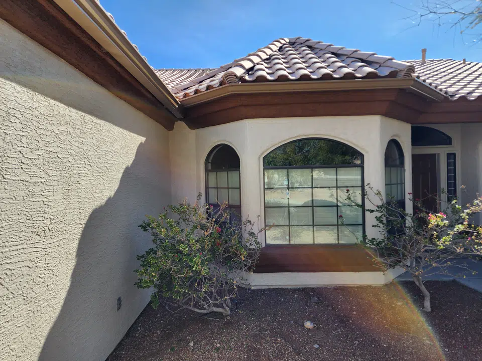 Finished roofline gutter installation on a Southwest home