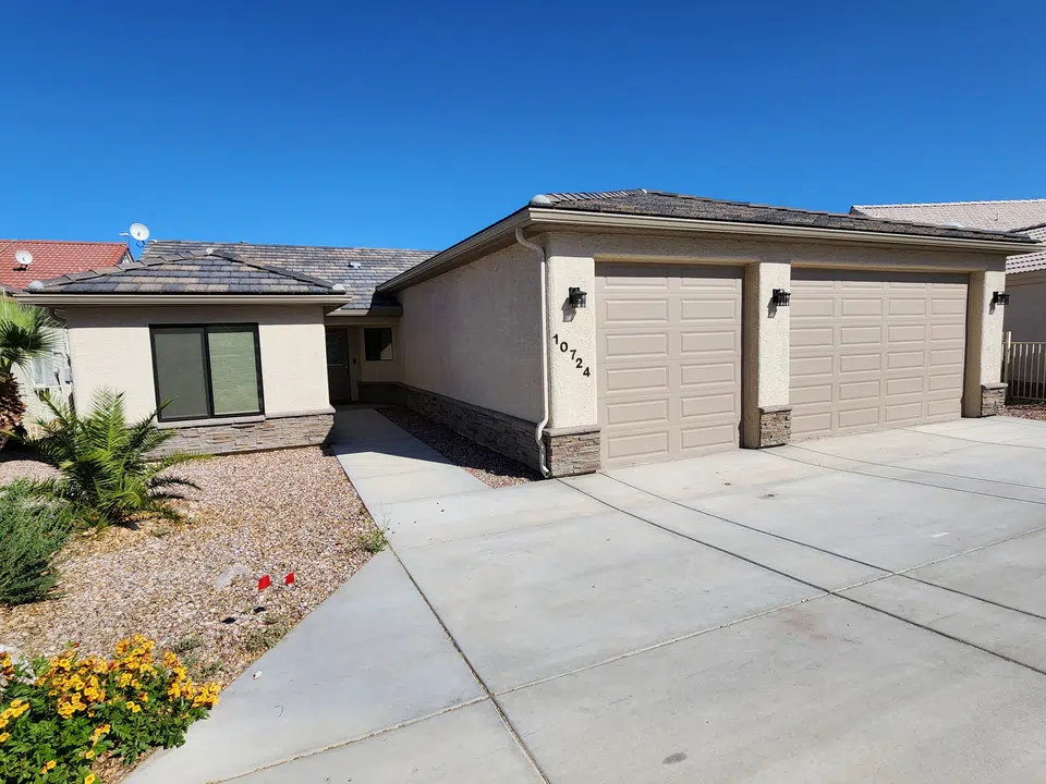 Finished roofline gutter installation on a Southwest home