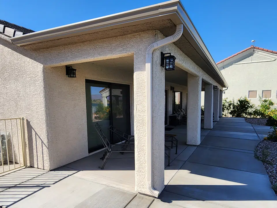 Eave line after seamless gutter installation