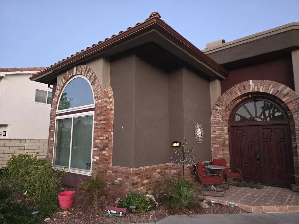 Finished roofline gutter installation on a Southwest home
