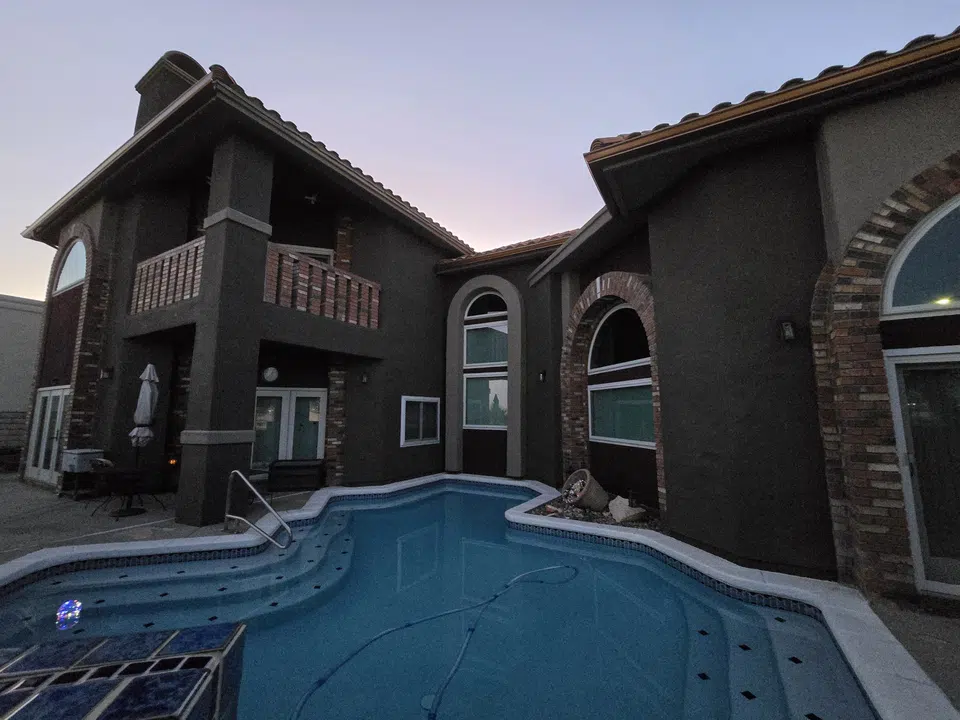 Finished roofline gutter installation on a Southwest home