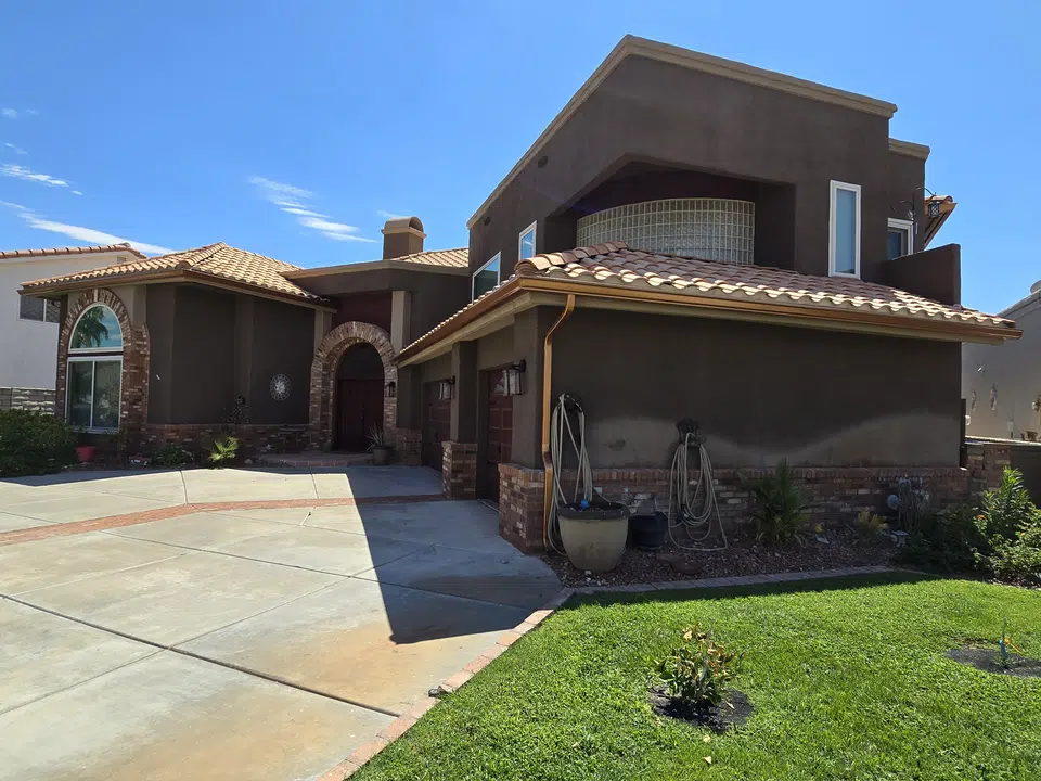 Eave line after seamless gutter installation