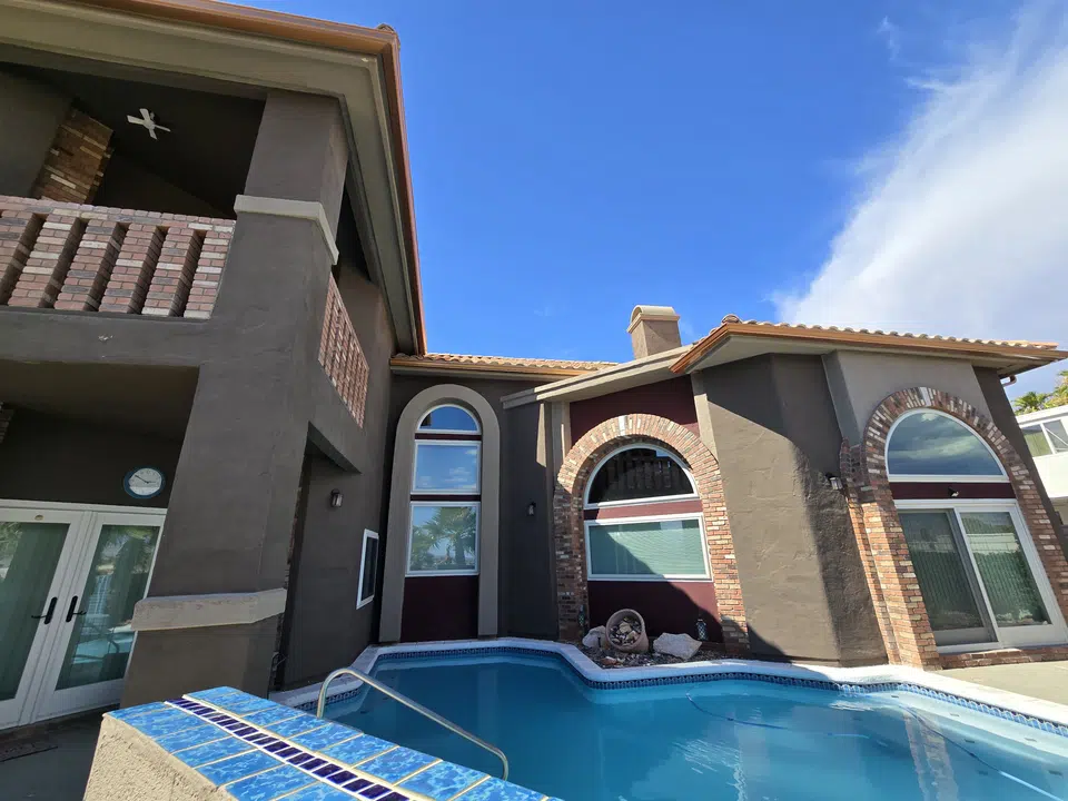 Finished roofline gutter installation on a Southwest home