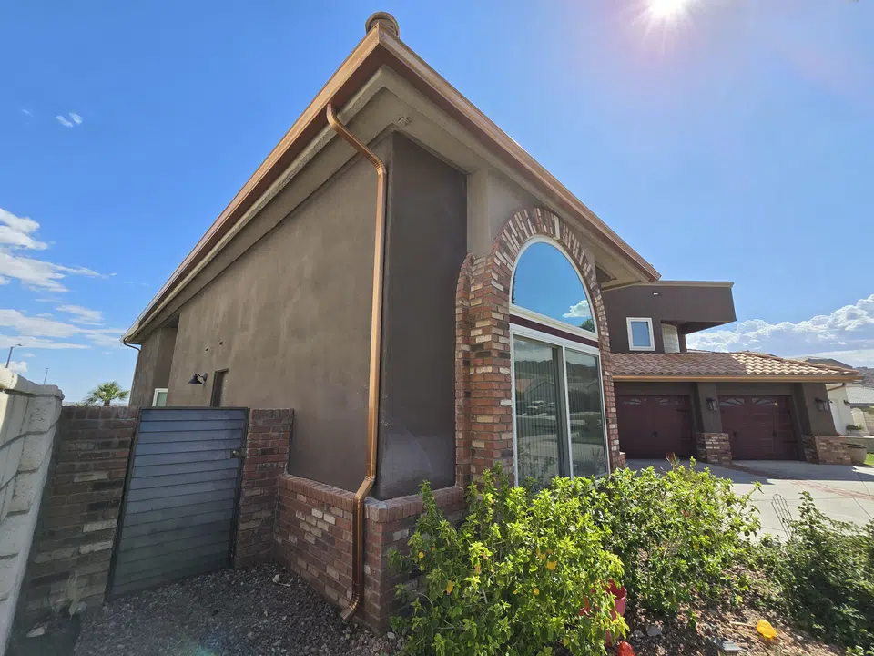 Rain gutter and downspout installation, completed work