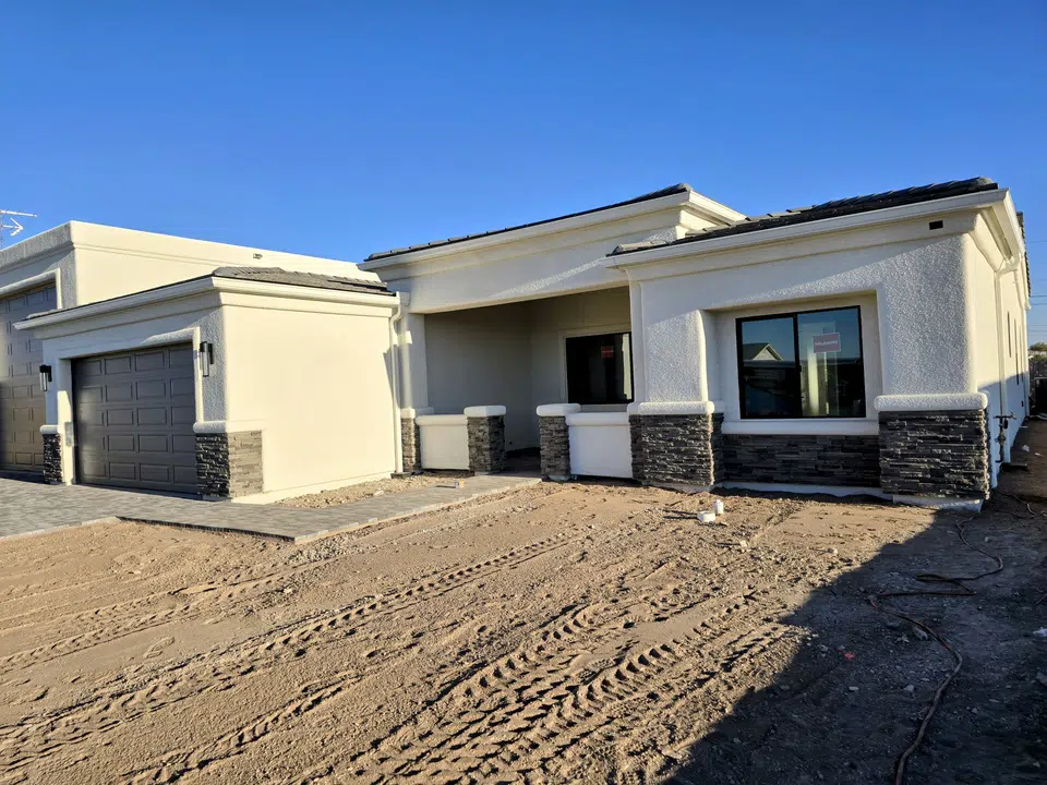 Rain gutter and downspout installation, completed work