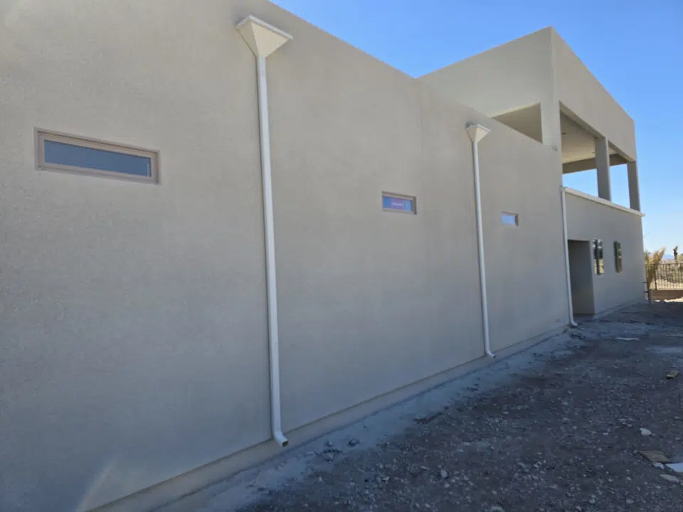 Seamless guttering formed and installed on-site