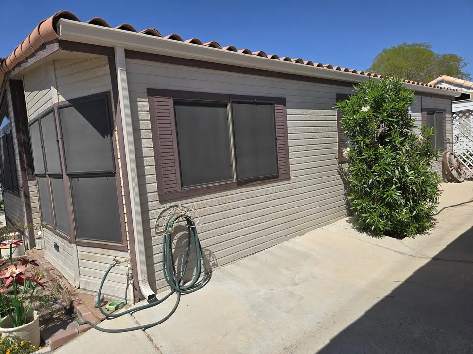 Finished roofline gutter installation on a Southwest home