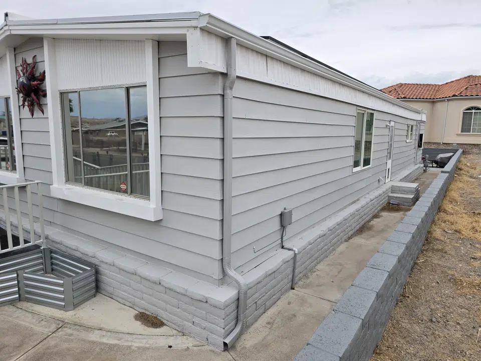 Rain gutter and downspout installation, completed work