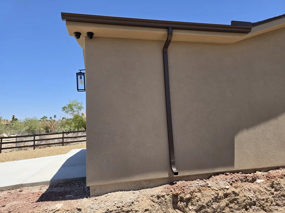 Installed seamless gutter system along the roof edge