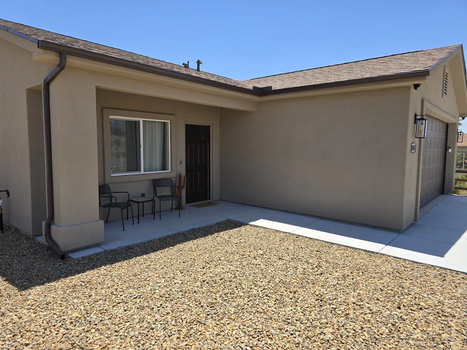 Eave line after seamless gutter installation