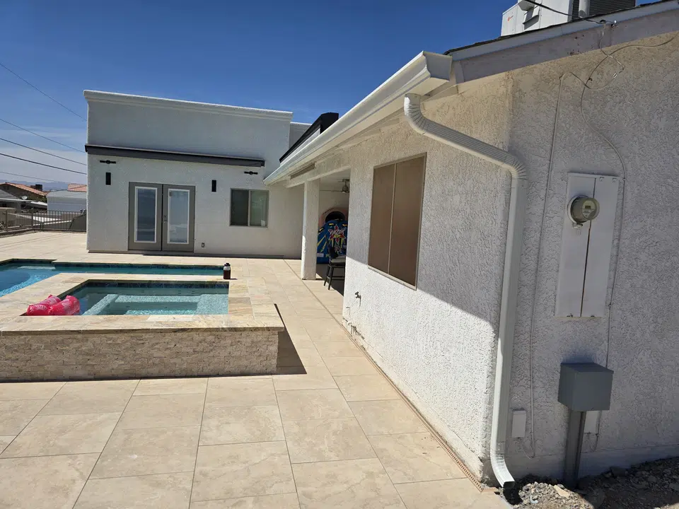Rain gutter and downspout installation, completed work