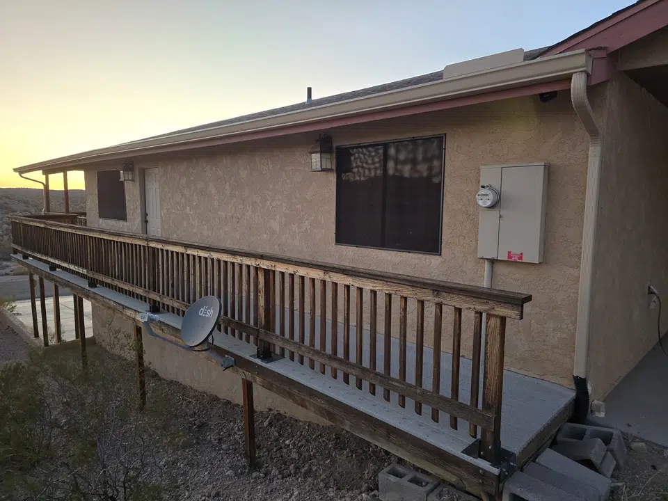 Eave line after seamless gutter installation