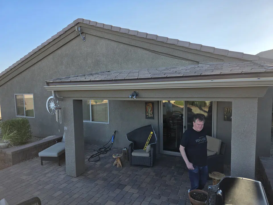 Finished roofline gutter installation on a Southwest home