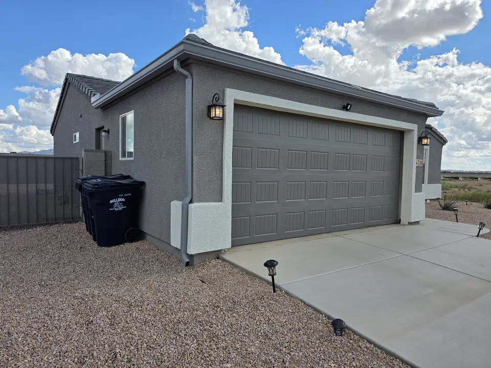 Eave line after seamless gutter installation