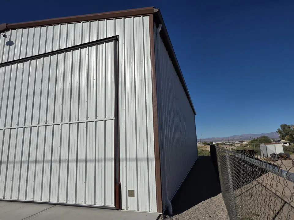 Rain gutter and downspout installation, completed work