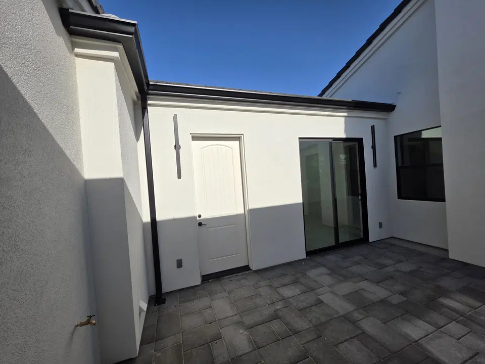 Roofline with newly installed seamless gutters