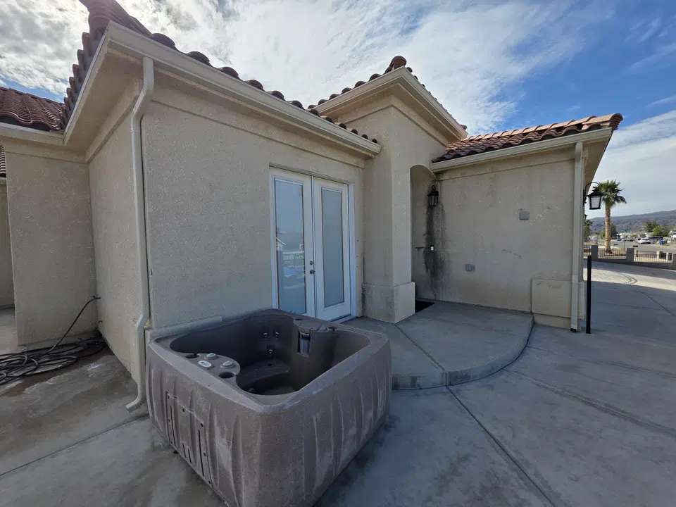 Finished roofline gutter installation on a Southwest home