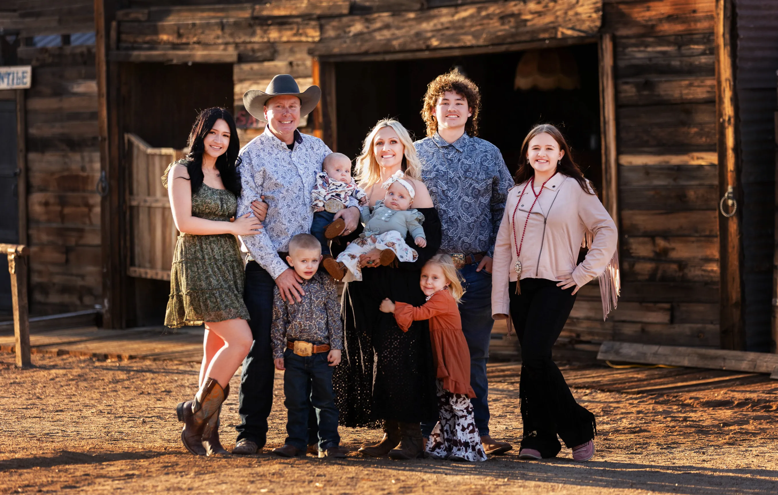Ryan and Nina Scheerer with their seven children, family owners of Southwest Seamless Rain Gutters serving Las Vegas, NV and Mohave County, AZ