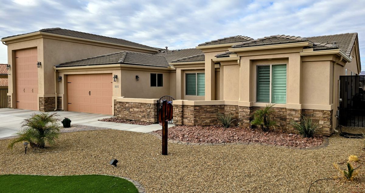 Seamless rain gutters installed on a ranch-style home in Lake Havasu City, AZ